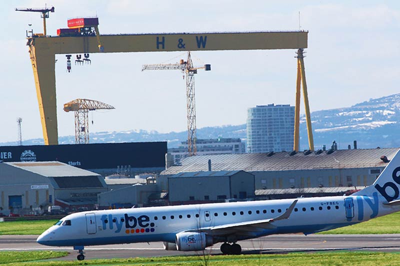 Flybe plane touching down at George Best Airport in Belfast