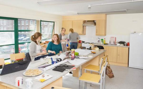 Flats are shared by 13 or 14 students, with one large kitchen in each flat.