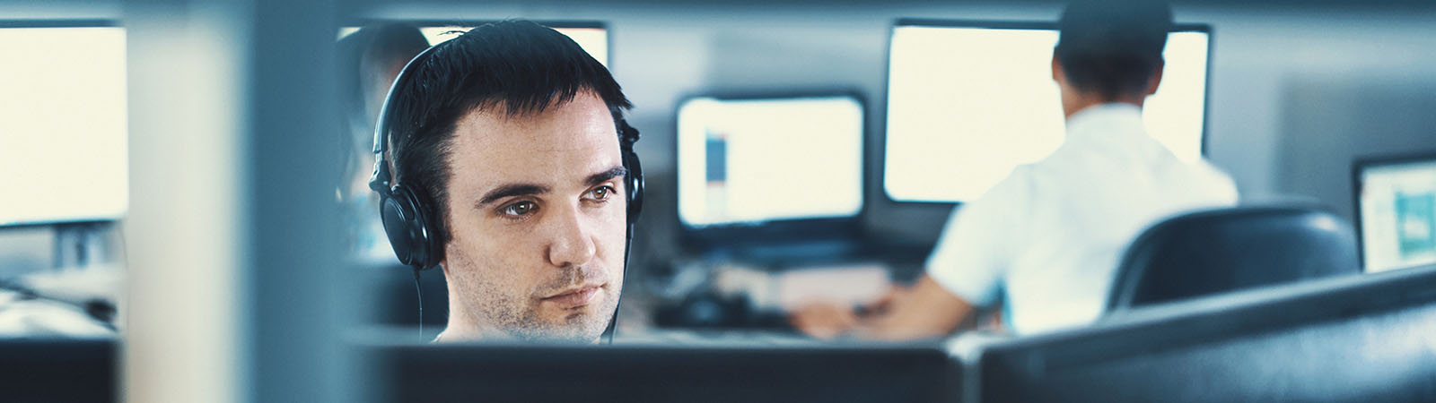 Man studying a computer screen