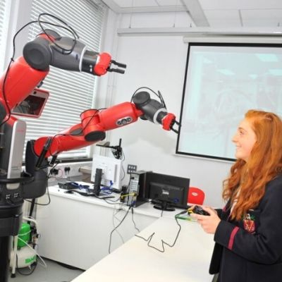Student interacting with a robot