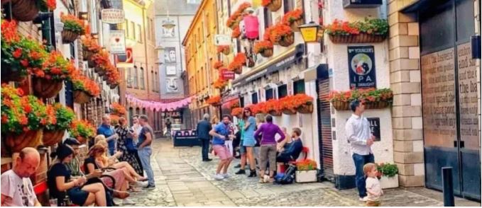 People outside the Duke of York bar