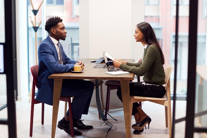 Two people at a table