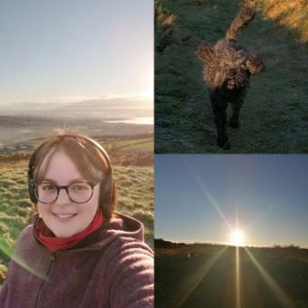 Image of Sarah in the outdoors, with her dog, and a lovely view of the landscape 