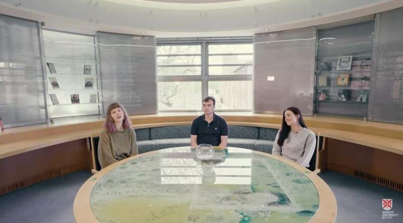 Three students in the CS Lewis Reading Room