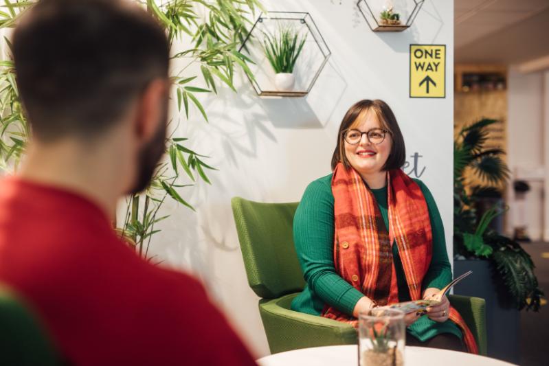 A Wellbeing Adviser coaching a student.