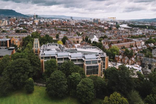 A view of the McClay Library from above with a view of Belfast
