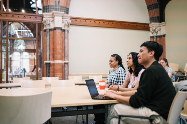 Students asking questions at a tutorial.