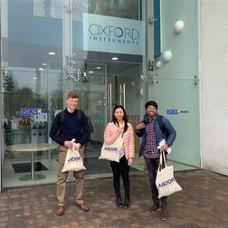 three students standing outside employers premises during work shadowing week