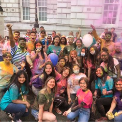 Students and staff gather outside Belfast City Hall to celebrate Belfast Mela.