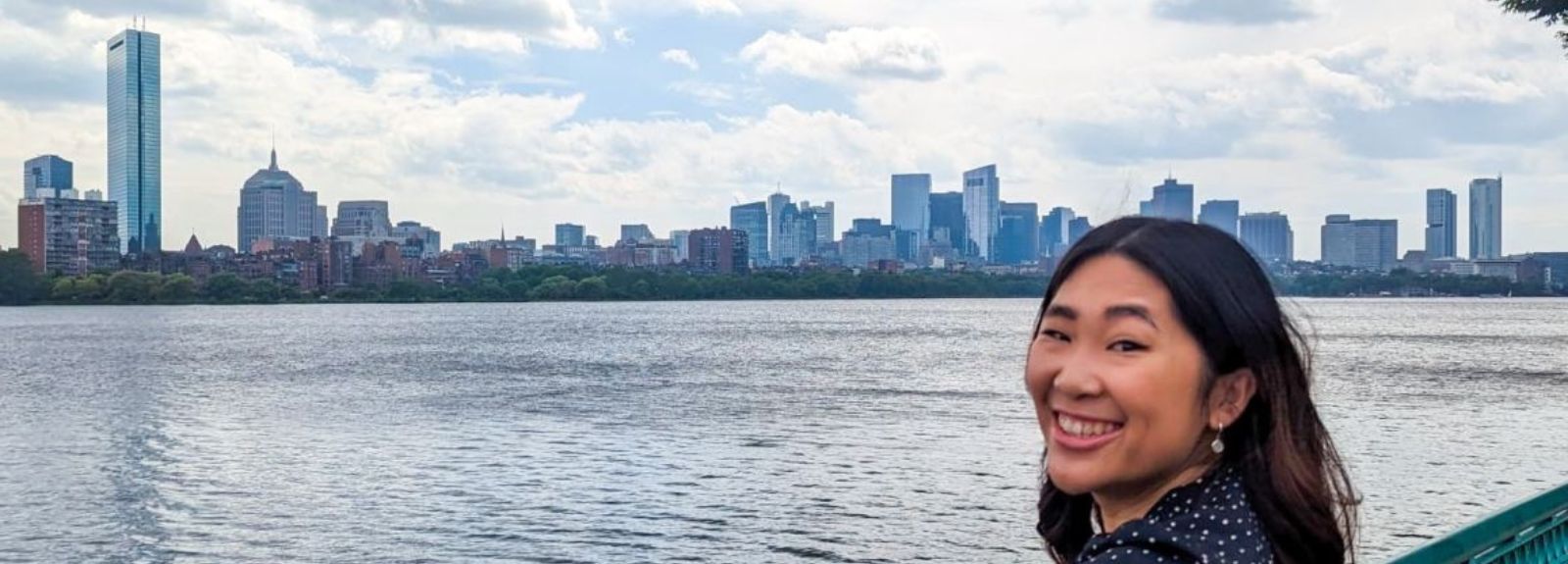 Student Caitlin Chee in Boston looking at a skyline