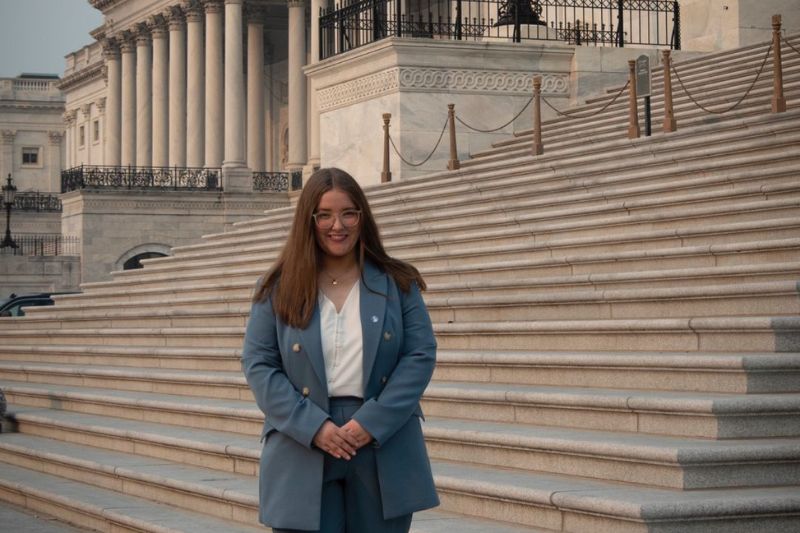 student outside steps of building in washington