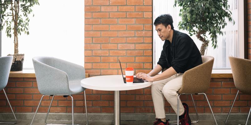 Student on laptop in Graduate School