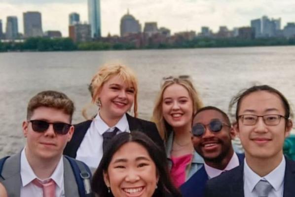 students standing in a group taking a selfie in Boston