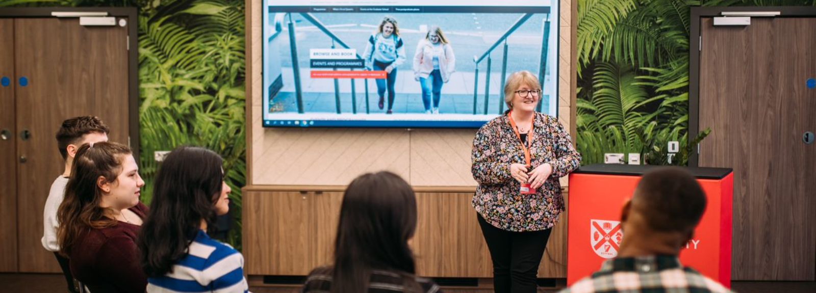 member of the careers team talking to a room full of students