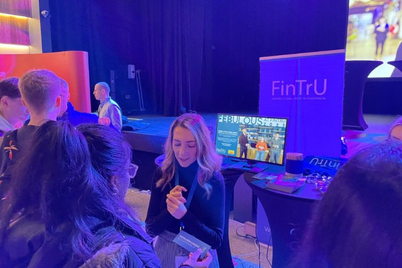 students at FinTrU stand at Spring Fair