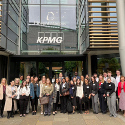 students standing together outside KPMG premises