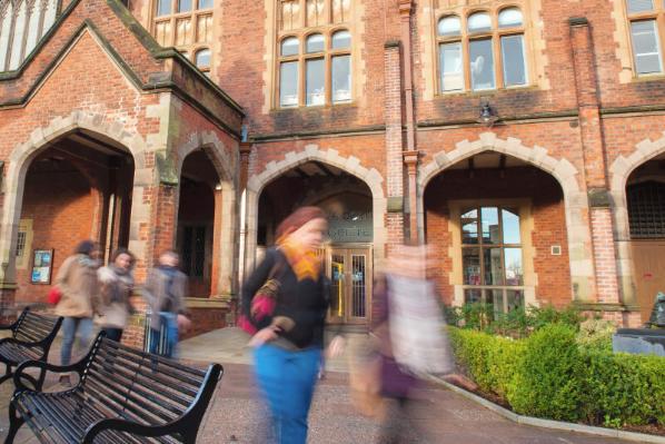 Students passing through The Quad on a winter morning