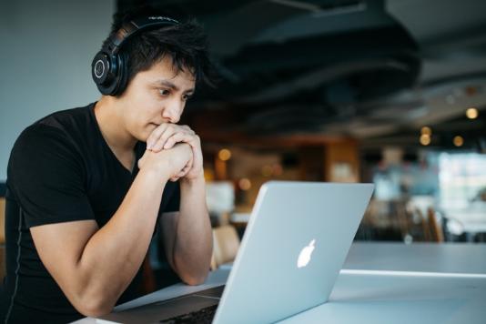 male student on laptop 800x533