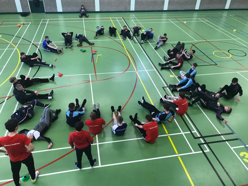 Pupils in the PEC doing exercises forming a circle