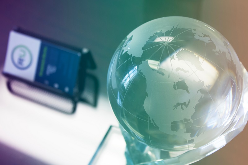 image of a globe and a mobile phone