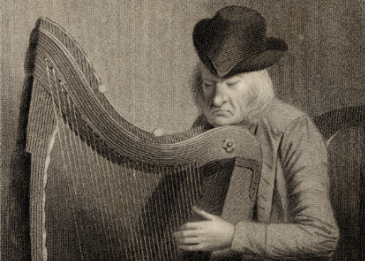 Denis Hempson playing the Irish harp. 