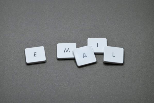 Tiles on a table spelling email