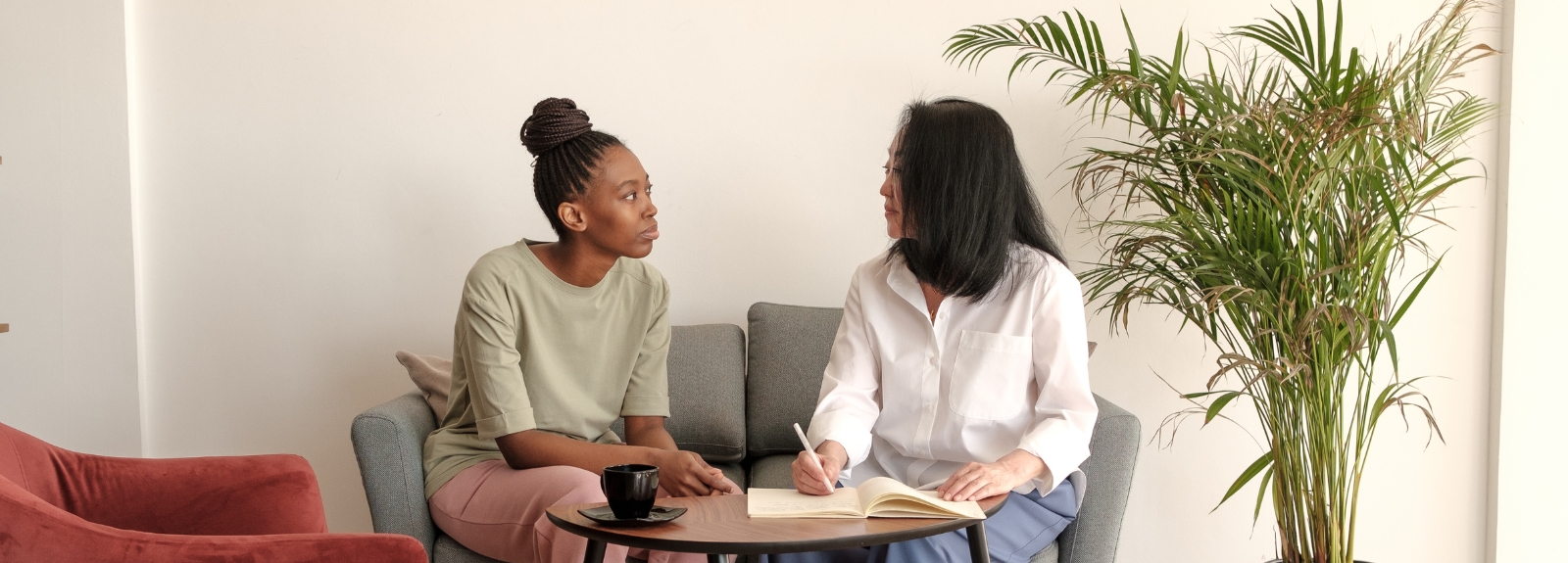 Two women providing support side by side