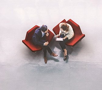 Photo: Aerial photo of business meeting