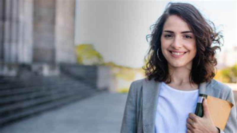 law student standing outside a court