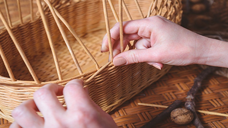 photo of basket weaving being done