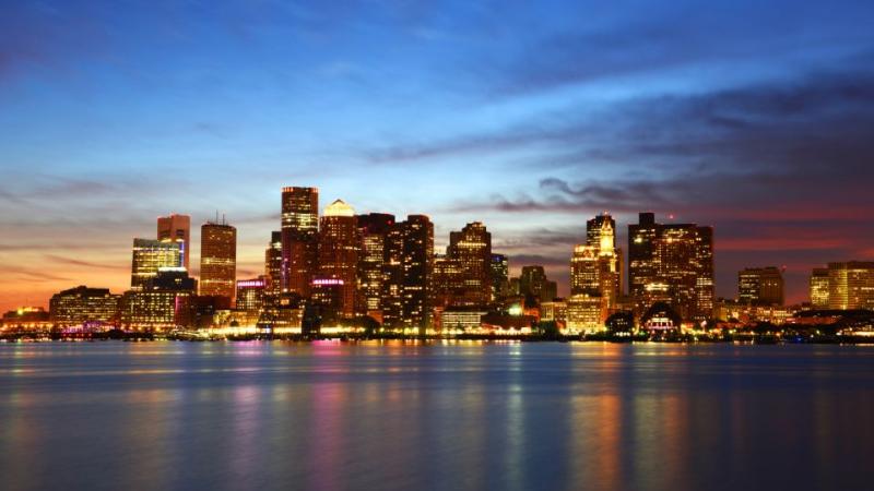 Buildings in Boston at night time in a cityscape