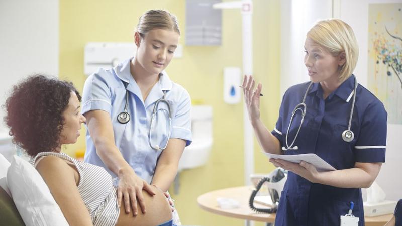 pregnant woman and nurses