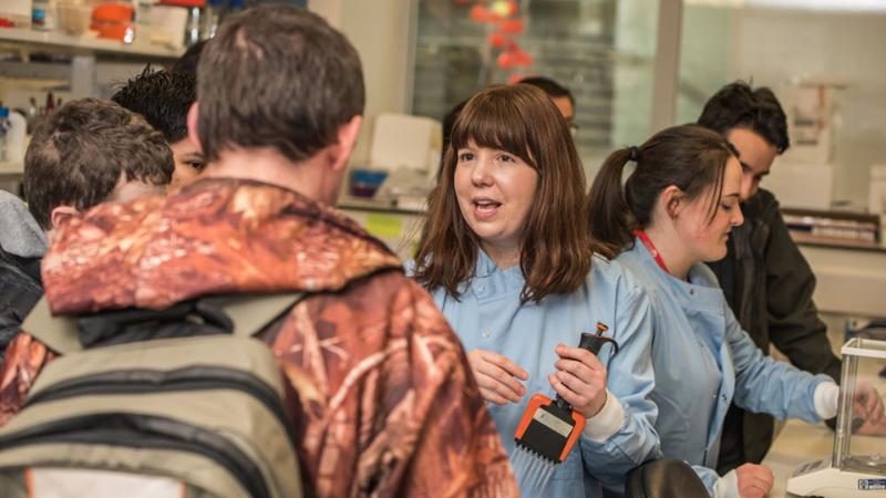 People chatting at an open day