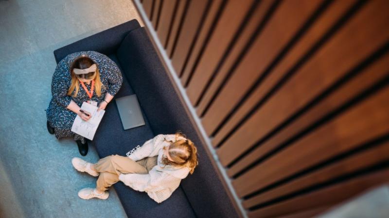 mentor talking to a student - birds eye view