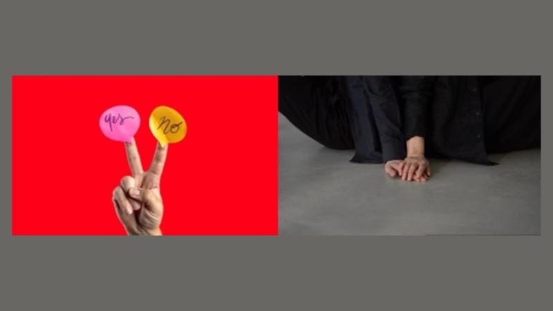 Peace sign with yes and no stickers on fingers and hands clasped on the floor