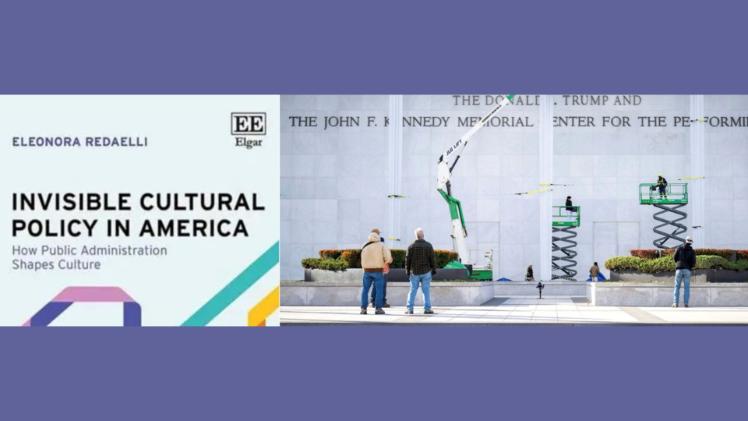 Two people looking at a sculpture