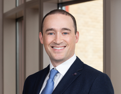 Man in suit smiling