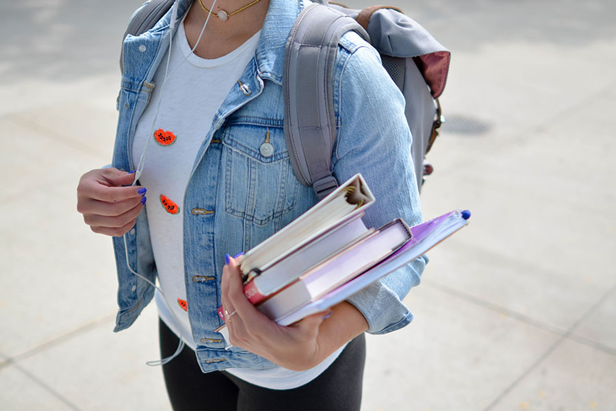 Student holding books