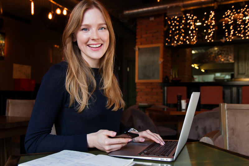 female entrepreneur sitting in a cafe
