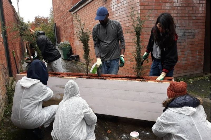 Volunteers at the alleyway transformation project
