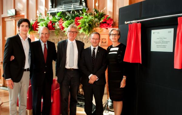 The photograph shows Senator George J. Mitchell and his family, Professor Hastings Donnan and the late Professor Patrick Johnston.