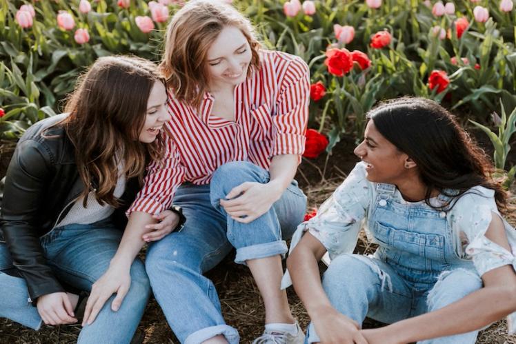 Young people in flower field