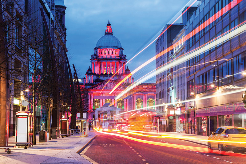 Belfast City Hall in pink light