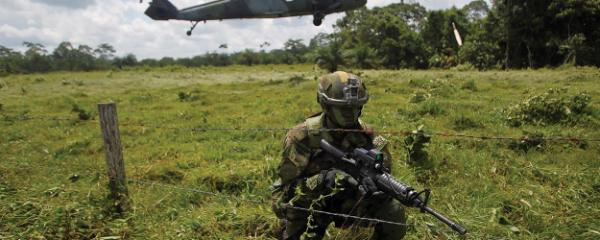 Soldier and helicopter