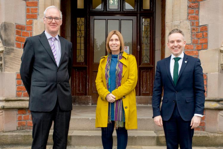 Linda Ervine pictured with Queen's hosts