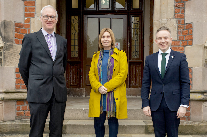 Linda Ervine pictured with Queen's hosts