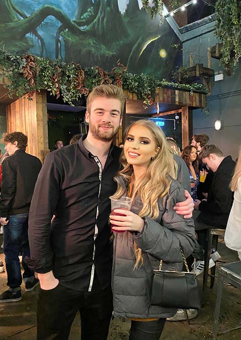 Claire Ford and friend at a bar