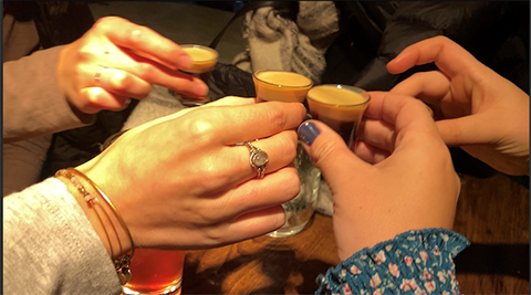 Hands doing shots