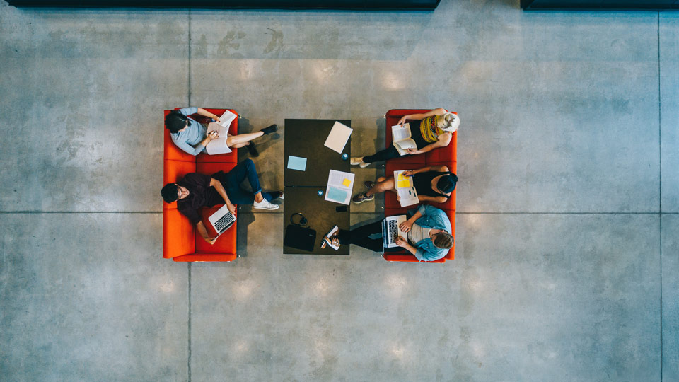 Overhead view of people sitting on chairs