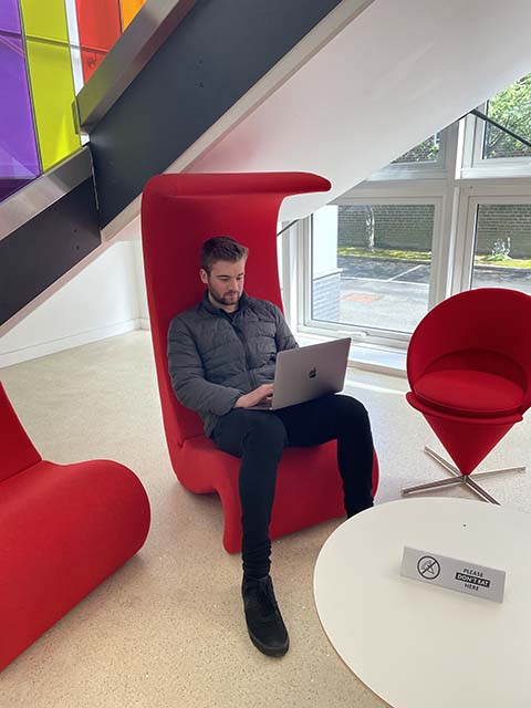 Tobias Hunter-Tod sitting in the Computer Science building